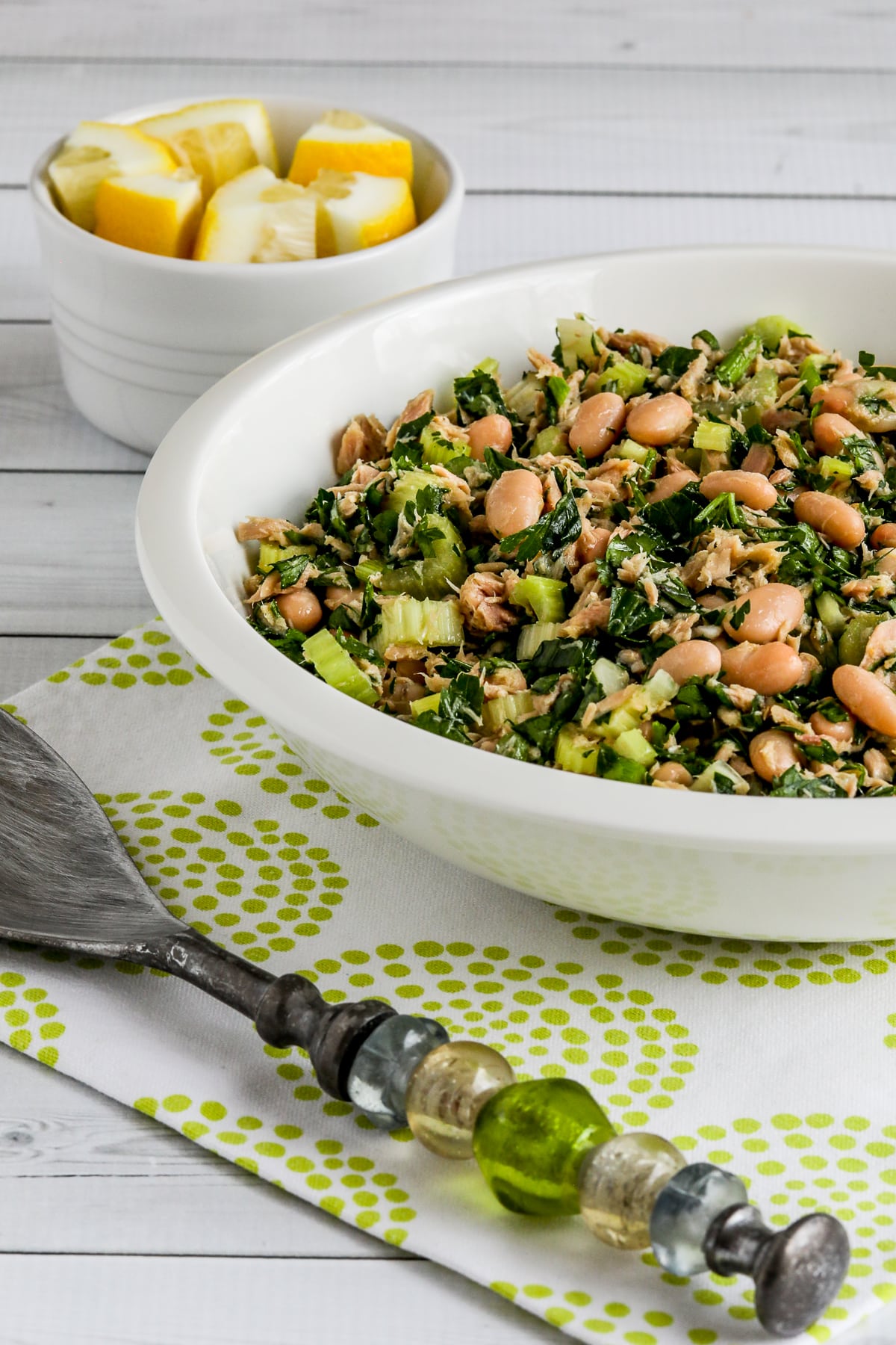 Tuna White Bean Salad in serving bowl with salad spoon