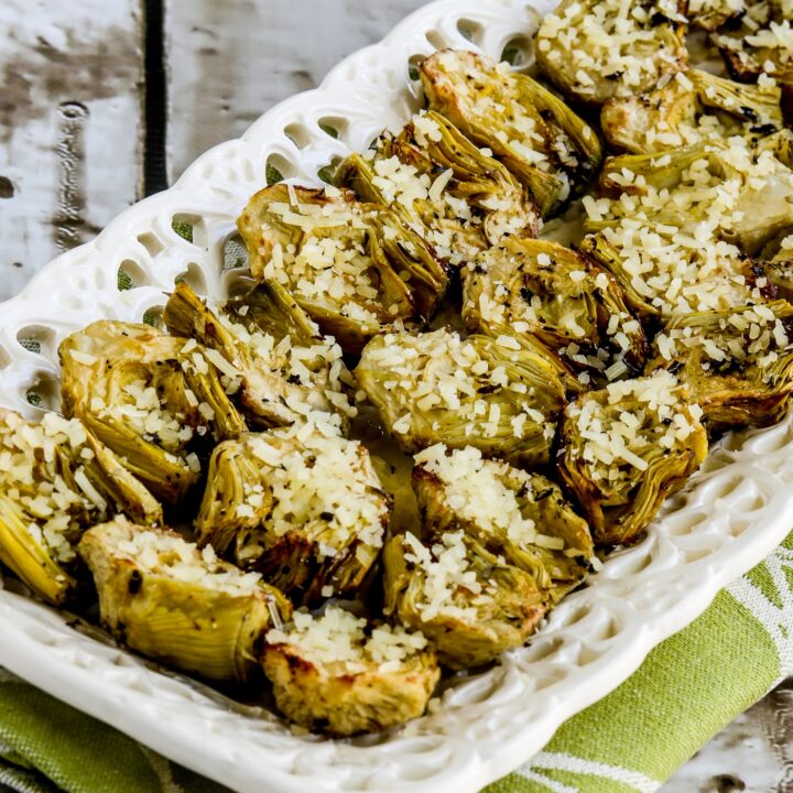 Air Fryer Artichoke Hearts appetizer on serving plate with grated Parmesan