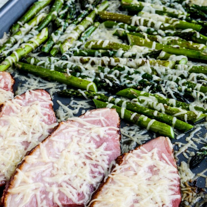 Easy Cheesy Baked Ham and Asparagus finished dish on sheet pan