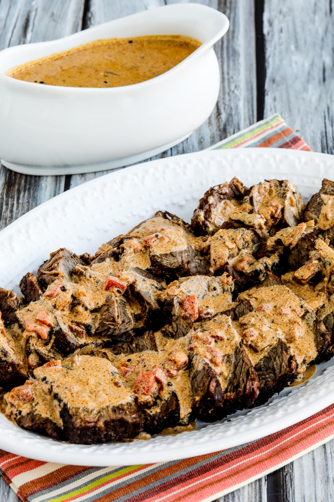 Instant Pot Hungarian Pot Roast finished pot roast on plate with sauce