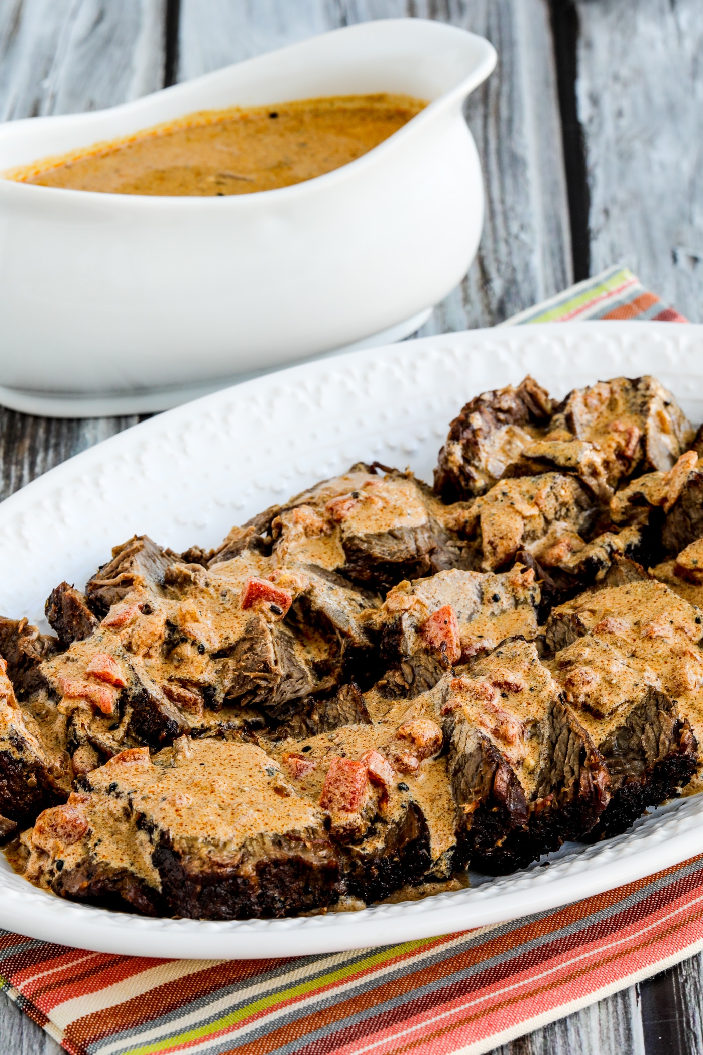 Slow Cooker Hungarian Pot Roast finished pot roast on plate with sour cream gravy