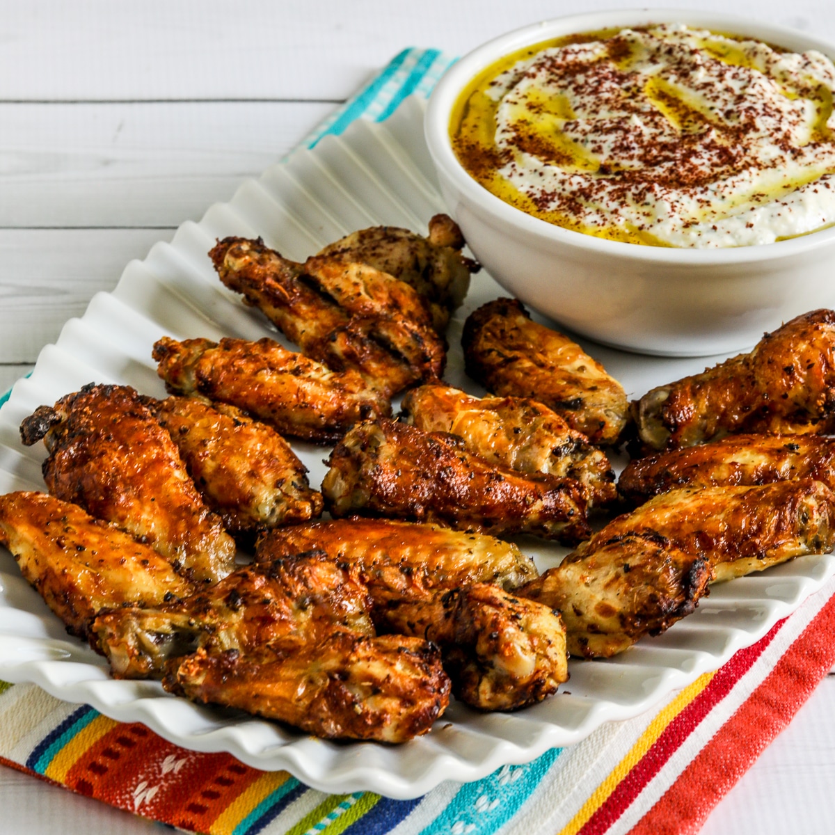 square image of Greek Air Fryer Chicken Wings on platter