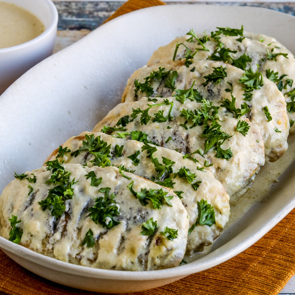 Square image for Janet's Easy Mustard Chicken shown on serving platter.