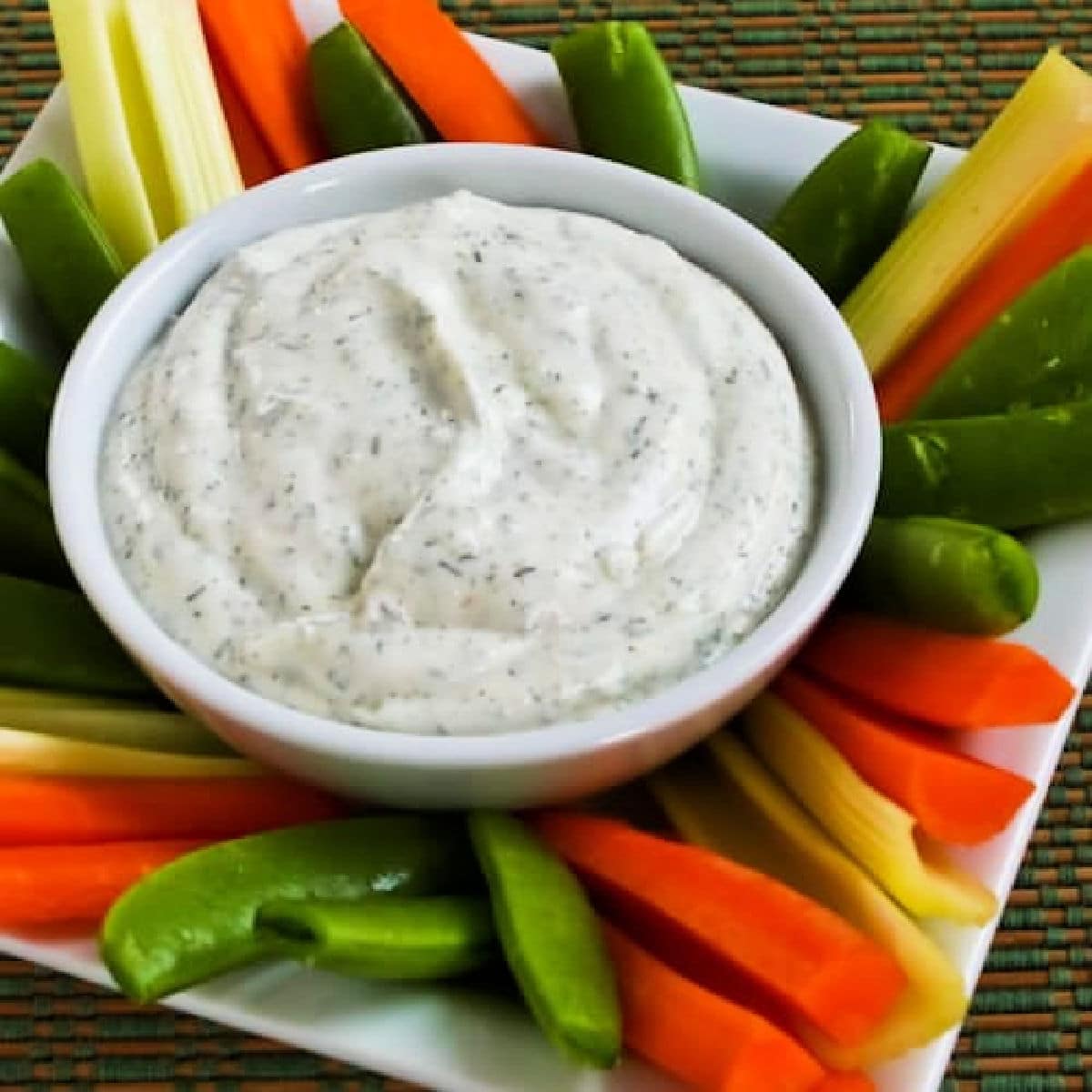 Square image of Grandma Denny's Homemade Ranch Dip shown with vegetables on serving platter.