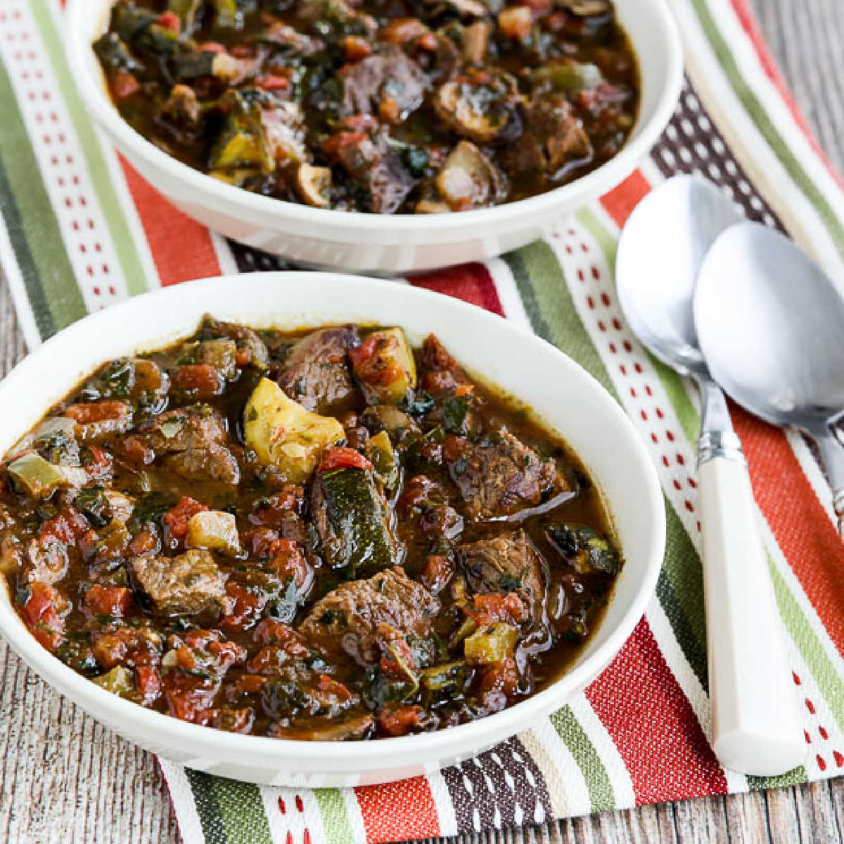 square image of Italian Beef Stew in two bowls with spoons