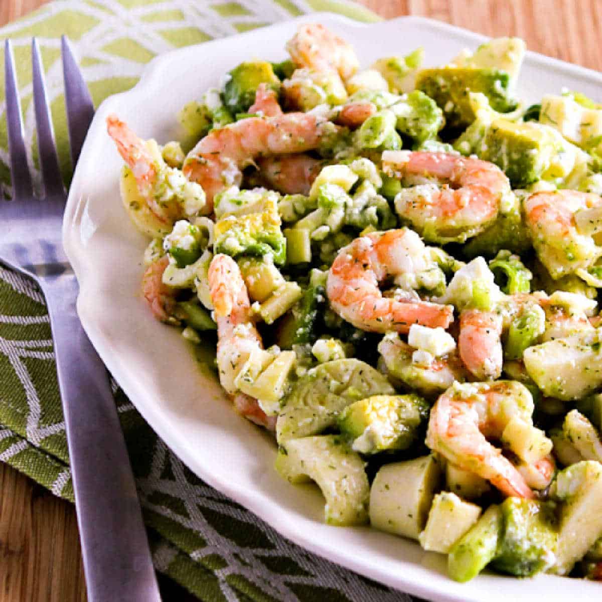 square image of lemony shrimp salad in serving bowl