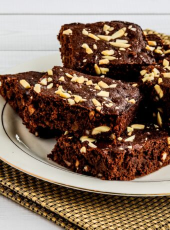 Almond Flour Brownies square image of brownies on serving plate