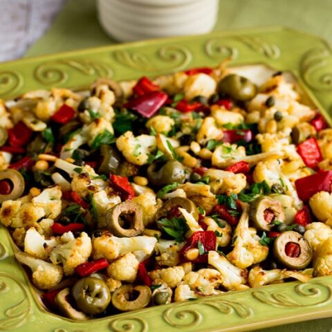 Roasted Christmas Cauliflower with Red Bell Pepper, Green Olives, and Pine Nuts [danicaskitchen.com]