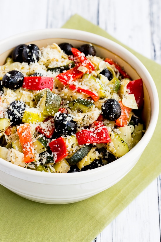 Marinated Zucchini Salad with Olives, Artichokes and Red Peppers finished salad in bowl