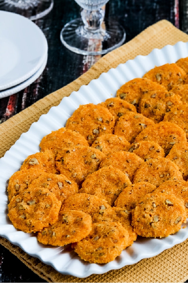 close-up of Cheddar Pecan Almond Crisps shown on serving plate