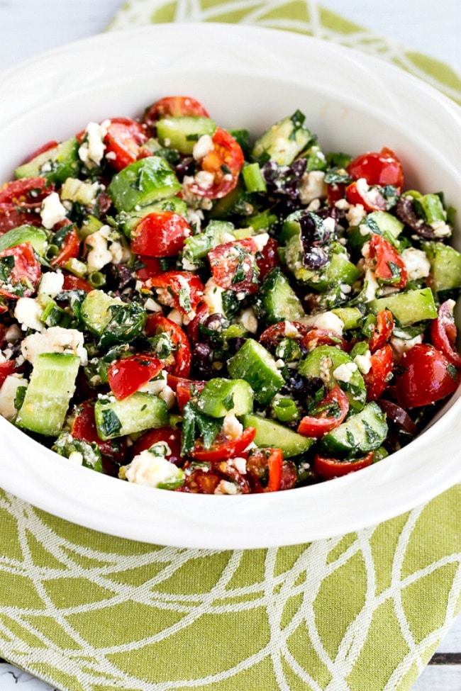 Tomato and Cucumber Salad with Mint and Feta close-up photo of finished salad