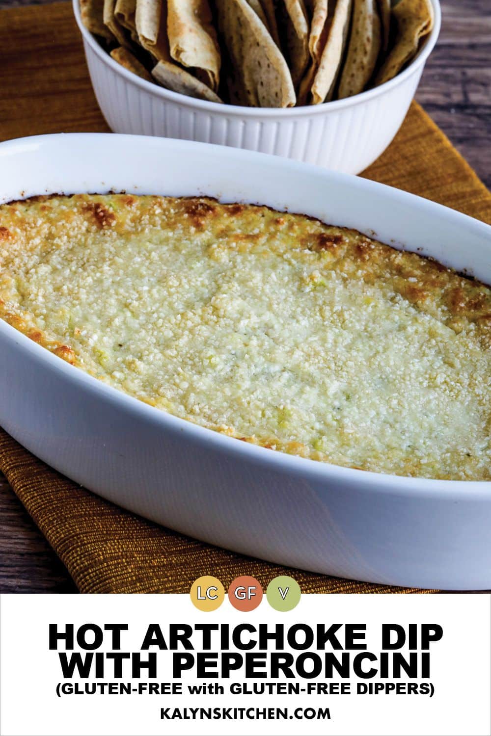 Pinterest image for Hot Artichoke with Peperoncini shown in baking dish with low-carb pita in back.